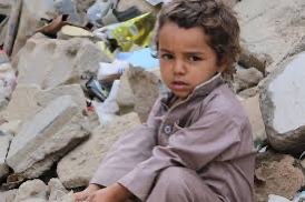 "In Yemen, a displaced boy sits amid the rubble at his family's destroyed home, in the northern city of Sa'ada" (THEIRWORLD, 2018)